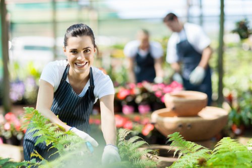 Team member wearing protective gear during landscaping tasks